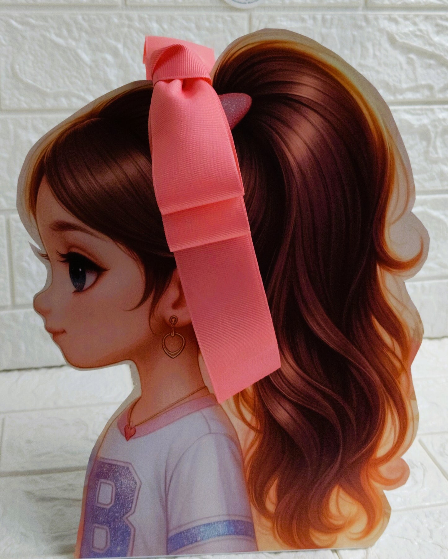 Illustration of a girl with brown hair in pigtails wearing a TinyShiny Bow Rose Pink color