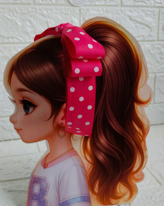 Illustration of a girl with brown hair in pigtails wearing a TinyShiny Bow Pink with white dots color 
