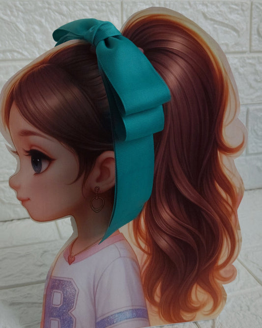 Illustration of a girl with brown hair in pigtails wearing a TinyShiny Bow Rama Green color 