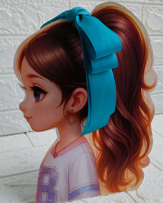 Illustration of a girl with brown hair in pigtails wearing a TinyShiny Bow Turquoise Blue color 